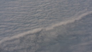 WA002_027 - 4K stock footage aerial video fly over a blanket of clouds over the Central Valley, California