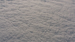 WA002_029 - 4K stock footage aerial video tilt from the edge of the clouds to thick cloud cover over the Central Valley, California