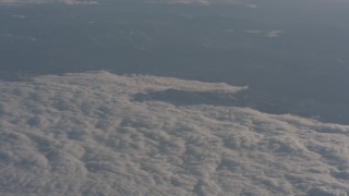 WA002_030 - 4K stock footage aerial video of the edge of the cloud layer over the Central Valley, California