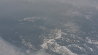 WA002_073 - 4K stock footage aerial video of snowy mountains beside Lake Tahoe, California