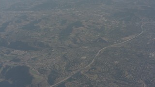 WA003_005 - 4K stock footage aerial video of freeway and suburban homes in Simi Valley, California