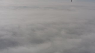 WA004_006 - 4K stock footage aerial video of a dense cover of clouds over Lassen County, California