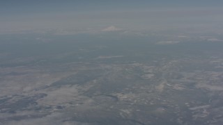WA004_009 - 4K stock footage aerial video tilt from snowy mountains to reveal Mount Shasta, Modoc County, California