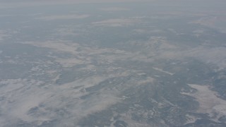 WA004_012 - 4K stock footage aerial video fly over snowy mountains in Modoc County, California