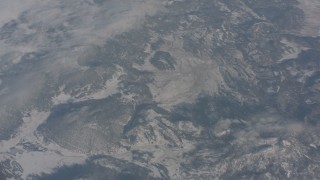 WA004_013 - 4K stock footage aerial video of a bird's eye view of snowy mountains in Modoc County, California