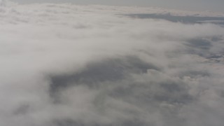 WA004_028 - 4K stock footage aerial video of reverse view of high altitude clouds over Lake County, Oregon