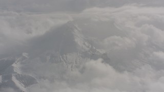 WA004_075 - 4K stock footage aerial video of turning from snowy Mount St. Helens in Washington