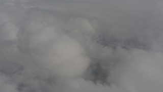 WA004_078 - 4K stock footage aerial video of flying by clouds over Skamania County, Washington