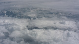 WA005_049 - 4K stock footage aerial video of a wide expanse of white clouds over Kansas