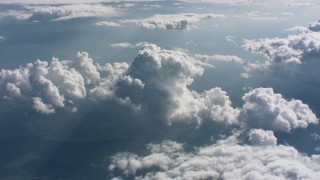 WA005_091 - 4K stock footage aerial video of cloud formations backlit by the sun over West Virginia