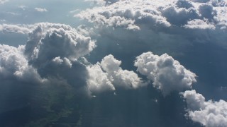 WA005_092 - 4K stock footage aerial video flyby clouds backlit by the sun over West Virginia