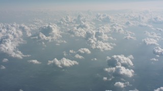 WA005_100 - 4K stock footage aerial video of passing clouds and hazy skies above West Virginia