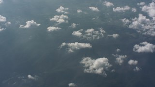 WA005_101 - 4K stock footage aerial video pan across partly cloud skies over West Virginia countryside