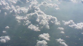 WA005_102 - 4K stock footage aerial video tilt from a bird's eye view of farms to reveal clouds over West Virginia