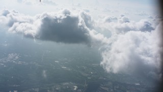 WA006_008 - 4K stock footage aerial video pan across cloud over Virginia towns