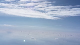 WA007_005 - 4K stock footage aerial video of flying between cloud layers high above North Carolina