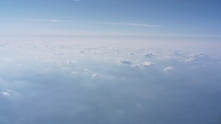 WA007_007 - 4K stock footage aerial video of hazy cloud cover high above North Carolina