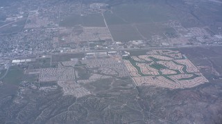 WA007_031 - 4K stock footage aerial video of suburban neighborhoods in Banning, California