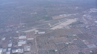 WA007_035 - 4K stock footage aerial video approach the the March Joint Air Reserve Base, Riverside, California