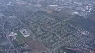 WA007_043 - 4K stock footage aerial video of residential neighborhoods and schools in Norco, California