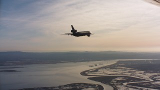 WAAF03_C005_01186V - 4K stock footage aerial video of a McDonnell Douglas KC-10 over Suisun Bay, California