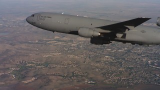 WAAF03_C008_01188V - 4K stock footage aerial video of a McDonnell Douglas KC-10 over neighborhoods in Northern California