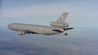 WAAF03_C020_0118MJ - 4K stock footage aerial video of a McDonnell Douglas KC-10 lowering the refuel boom in Northern California