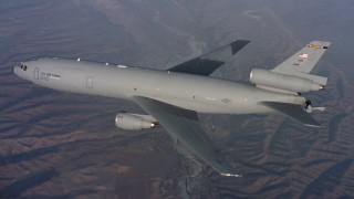 WAAF03_C023_0118T3_S000 - 4K stock footage aerial video of a McDonnell Douglas KC-10 raising the refueling boom in Northern California