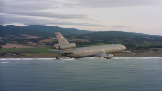 WAAF03_C042_011881_S000 - 4K stock footage aerial video of a McDonnell Douglas KC-10 in flight near the Northern California coast
