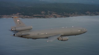 WAAF03_C046_0118XN - 4K stock footage aerial video of a McDonnell Douglas KC-10 flying near the coast in Northern California