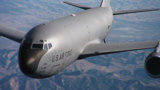 WAAF04_C045_01185M - 4K stock footage aerial video of panning across a Boeing KC-135 from engines to cockpit in Northern California