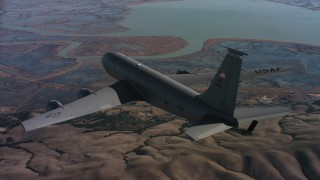 WAAF04_C085_0118RQ - 4K stock footage aerial video of flying around the tail of a Boeing KC-135 over Northern California