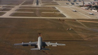 WAAF04_C098_011802 - 4K stock footage aerial video of a Boeing KC-135 landing at Travis Air Force Base, California